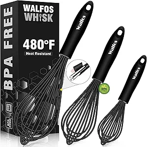 Stainless Steel Whisk on Dark Countertop