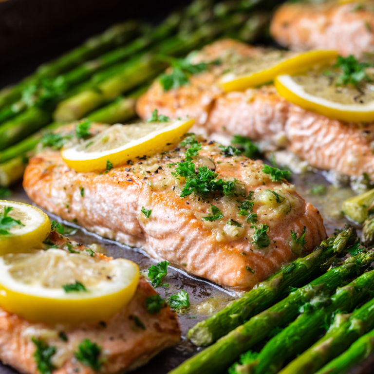 A vibrant sheet pan salmon and asparagus dish, perfectly roasted and garnished with fresh herbs, ready to serve.